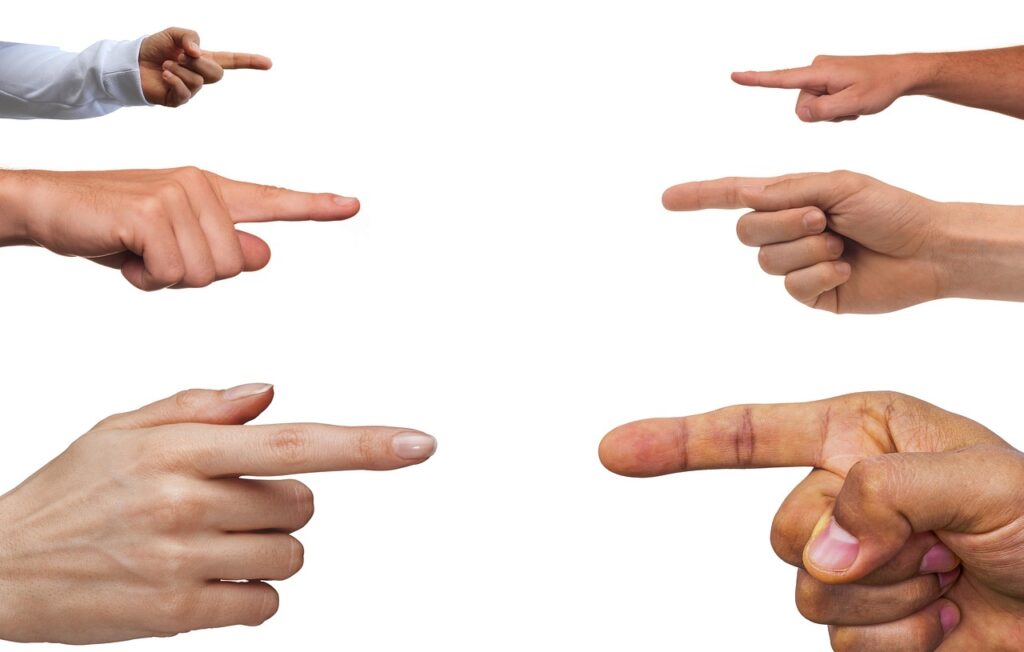 pointing, gesture, confrontation, finger, index finger, hands, accusation, blame, fight, disagree, dispute, argument, group, sides, opposite, blame, blame, blame, blame, fight, disagree, dispute, argument, argument, argument, argument, argument